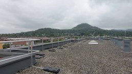 Collective protection on graveled flat roof