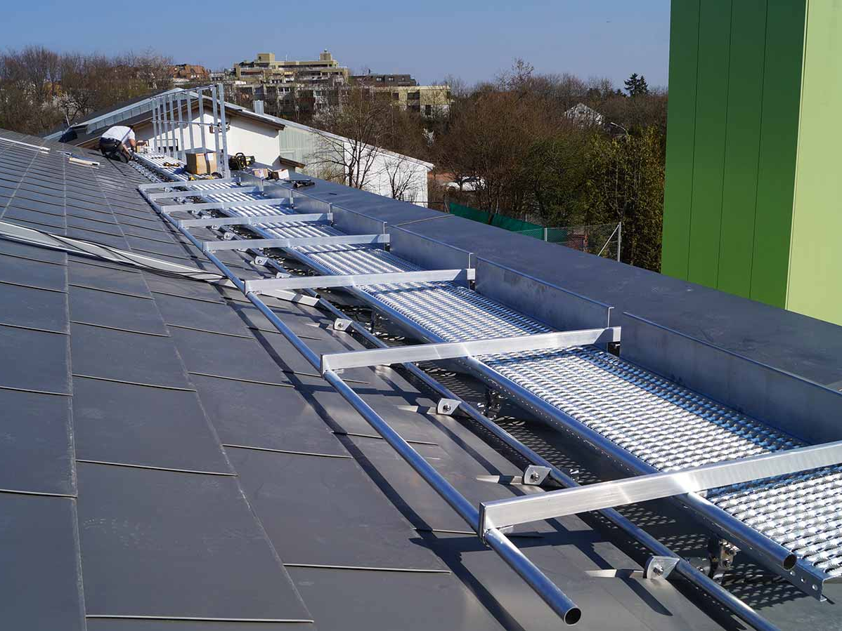 Walkway with foldable guardrails